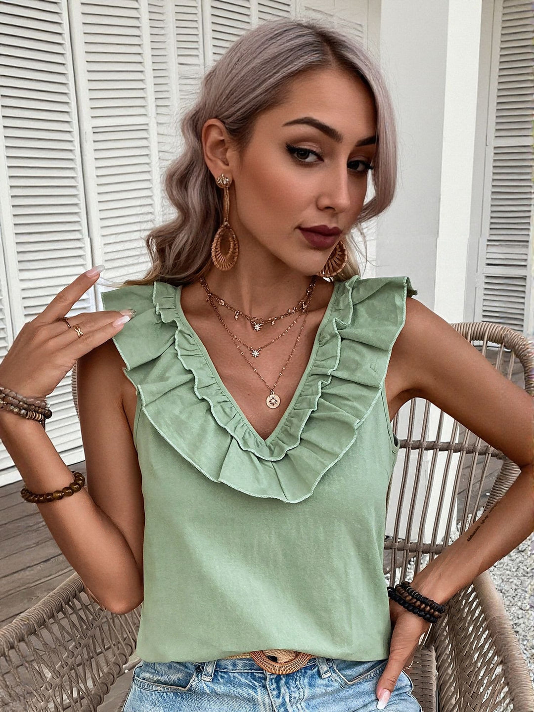 Green Sleeveless Top With Ruffle Neck Detail