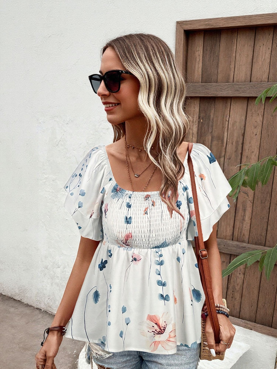 White Top With Flared Sleeve And Smocking Detail