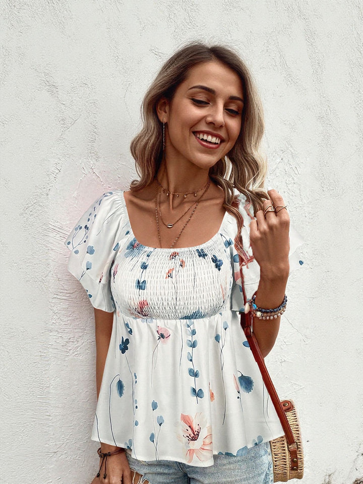 White Top With Flared Sleeve And Smocking Detail