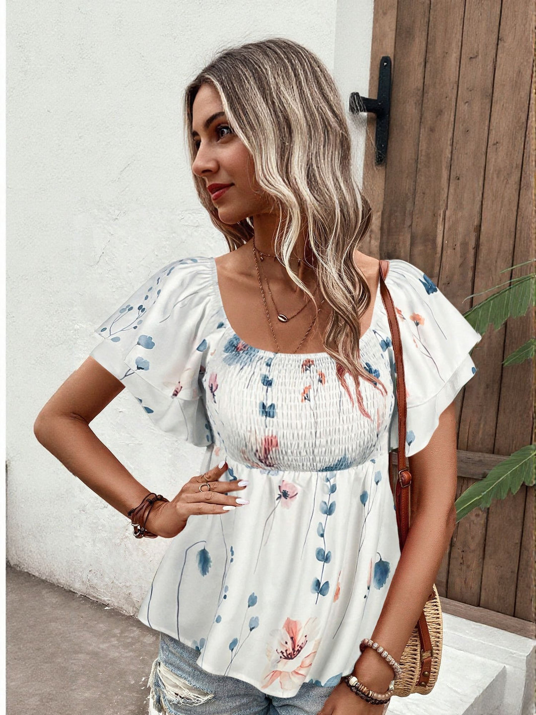 White Top With Flared Sleeve And Smocking Detail