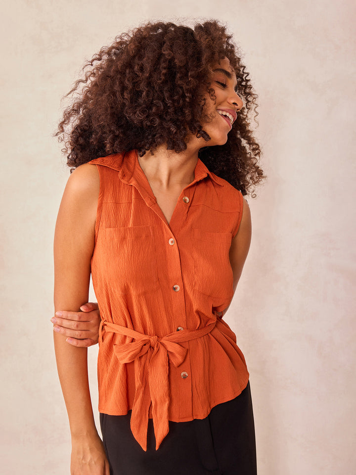 Rust Sleeveless Shirt With Pocket And Tie Up Detail