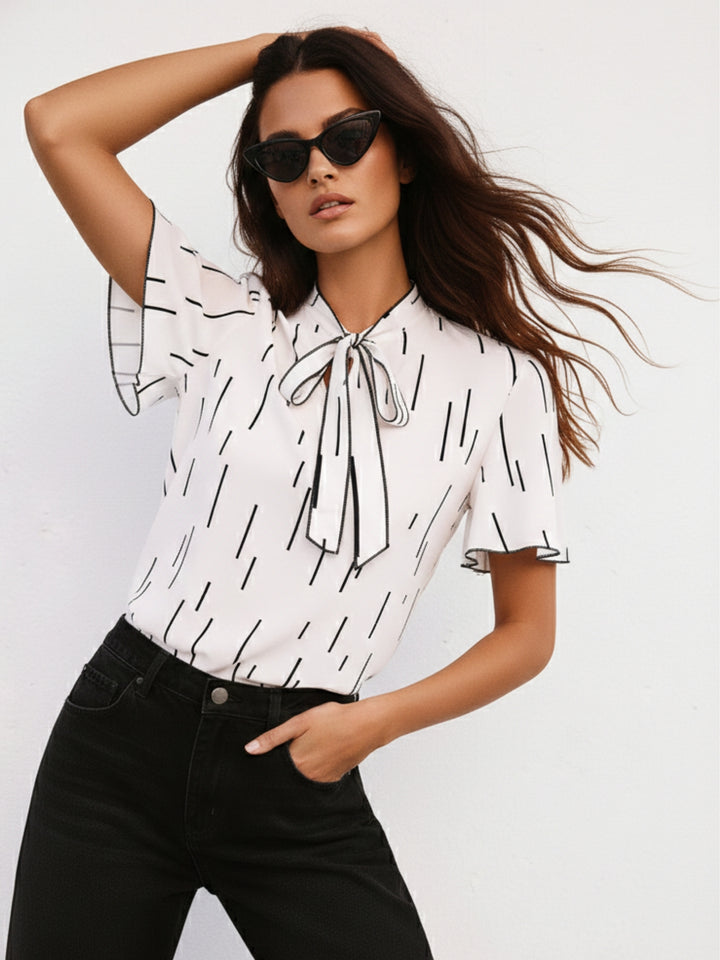 White Flutter Sleeved Printed Blouse