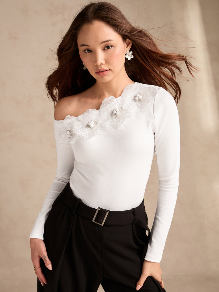 White Off-Shoulder Top With Floral Embellishments