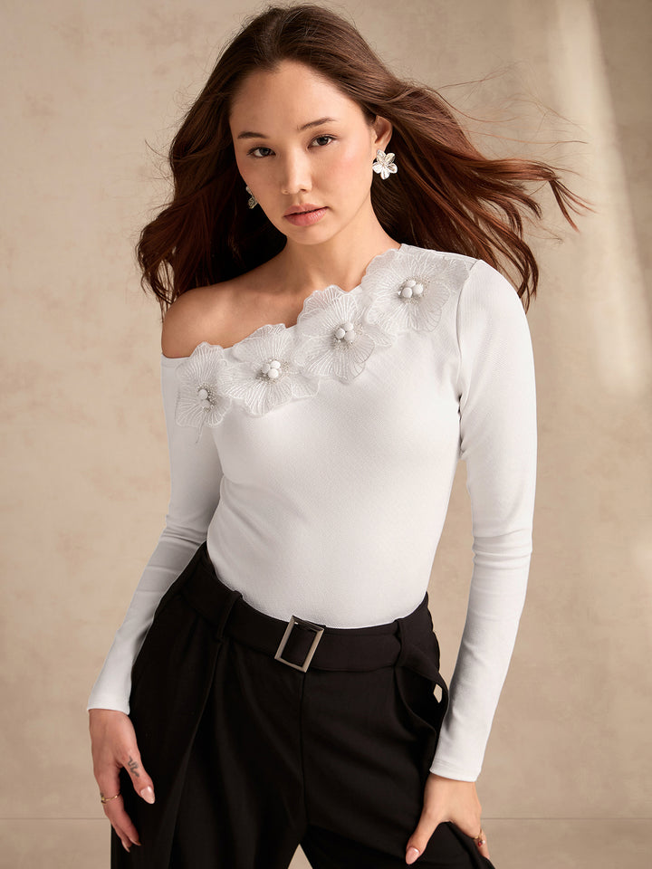 White Off-Shoulder Top With Floral Embellishments