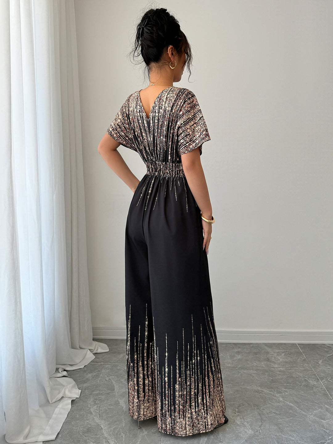 Black Shimmer Plunge Neck Jumpsuit