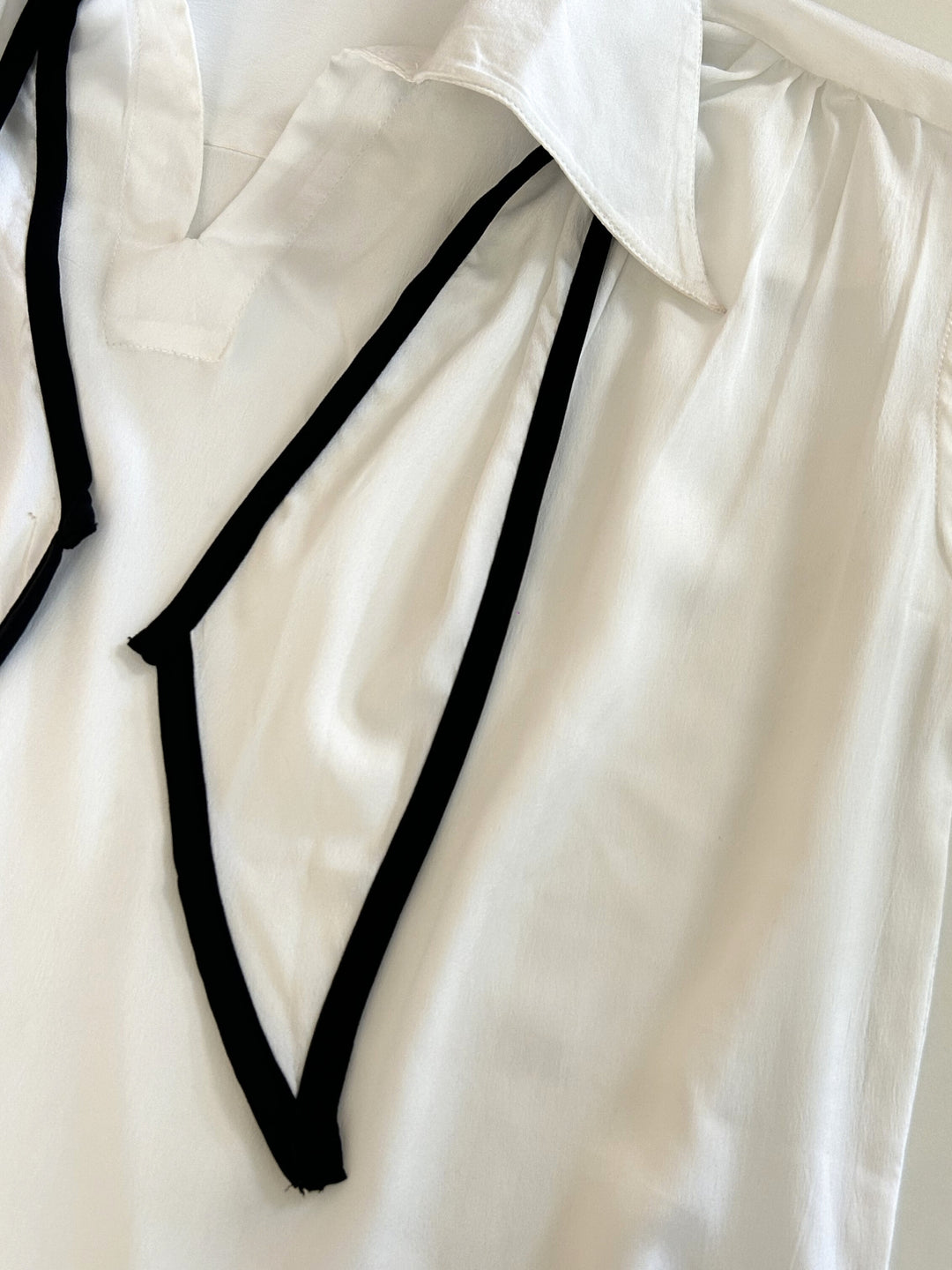 Off White Sleeveless Tie-Neck Blouse