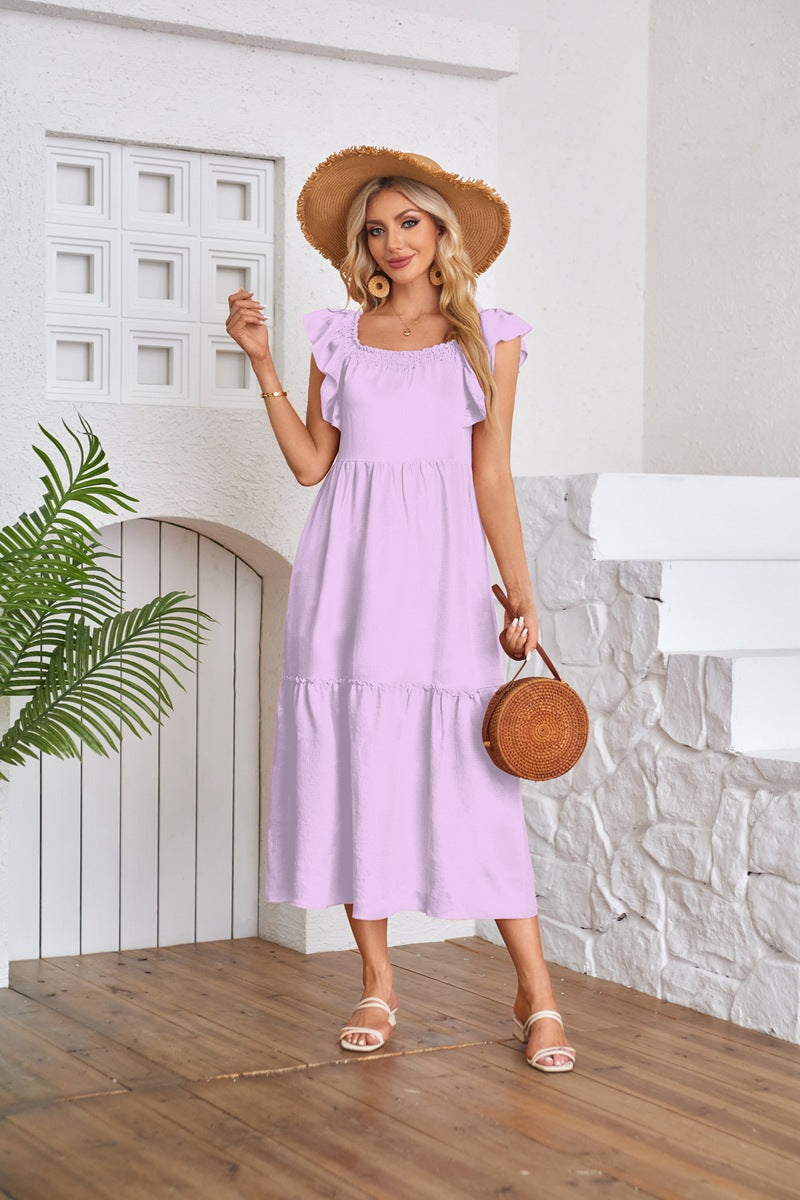 Purple Solid Flutter Sleeved Empire Waist Smocked Dress