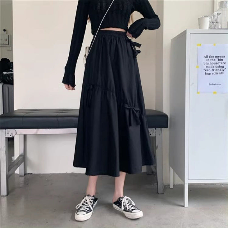 Black Flared Skirt With Bow Detail