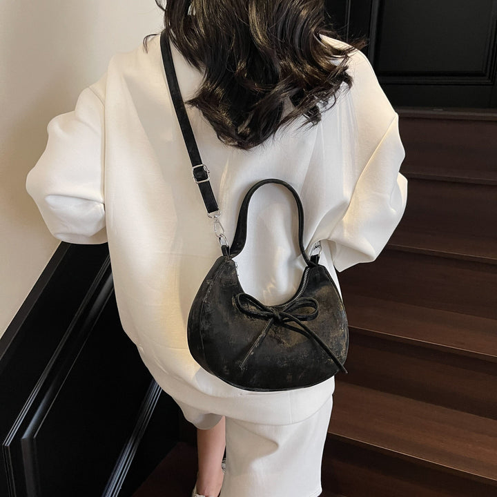 Black Moon Lit Bow Cross Bag