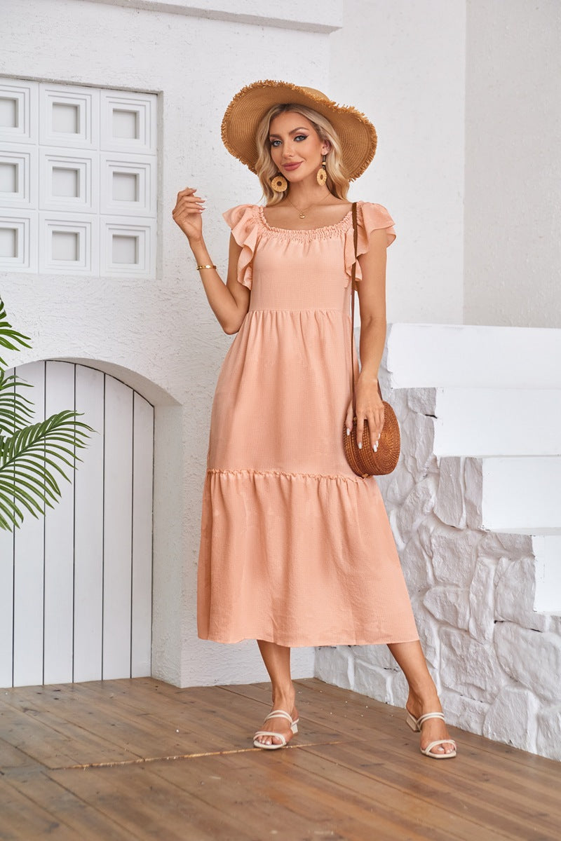 Peach Solid Flutter Sleeved Empire Waist Smocked Dress