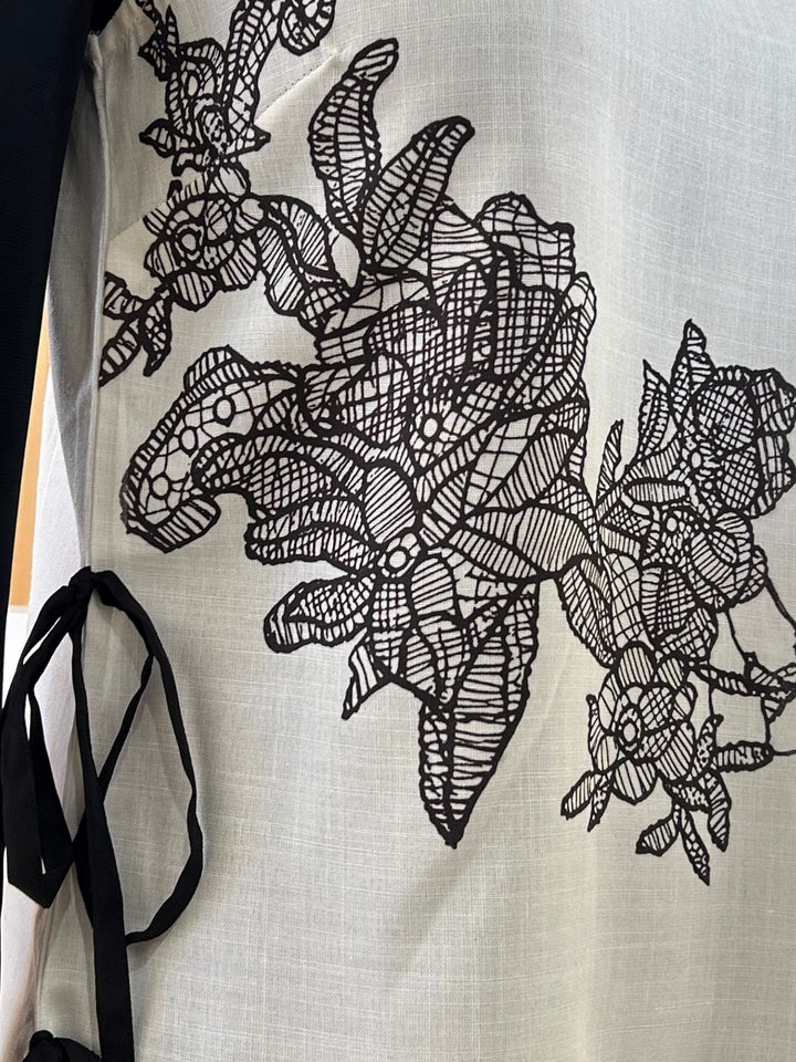 Off White Printed Floral Bouse With Tie  Up Bow Detail