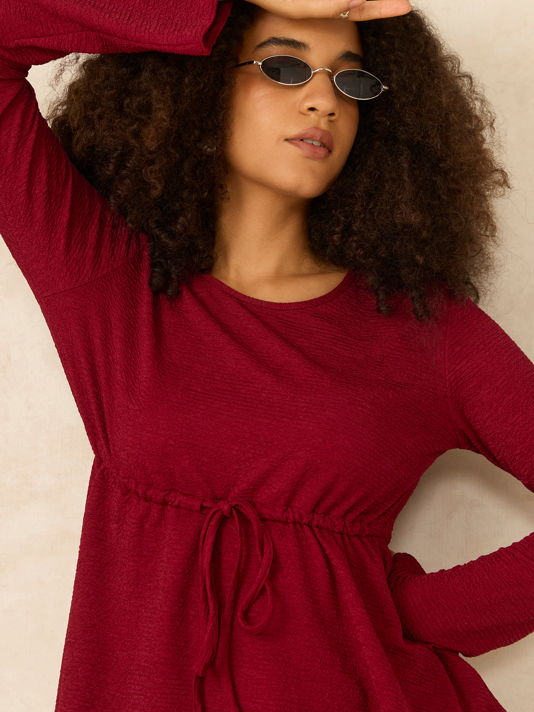Maroon Round Neck Peplum Top With Full Sleeves