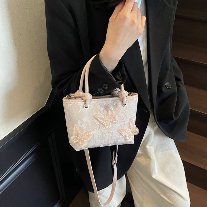 Pink Butterfly Embossed Hand Bag
