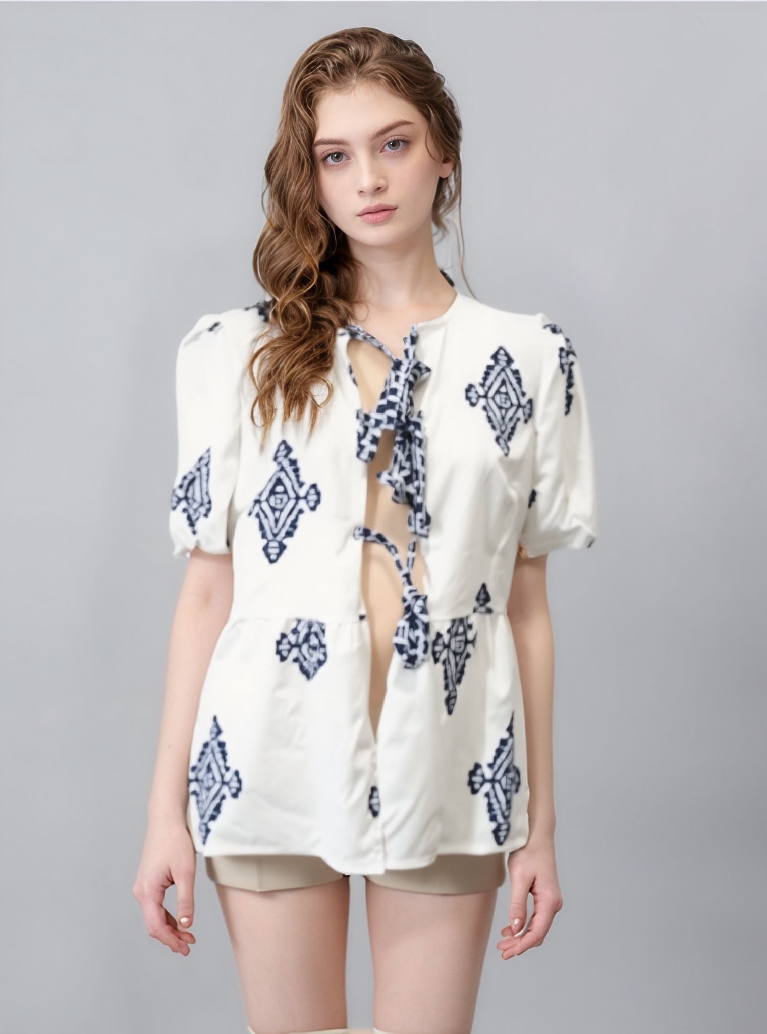 White Printed Front Tie Up Peplum Top
