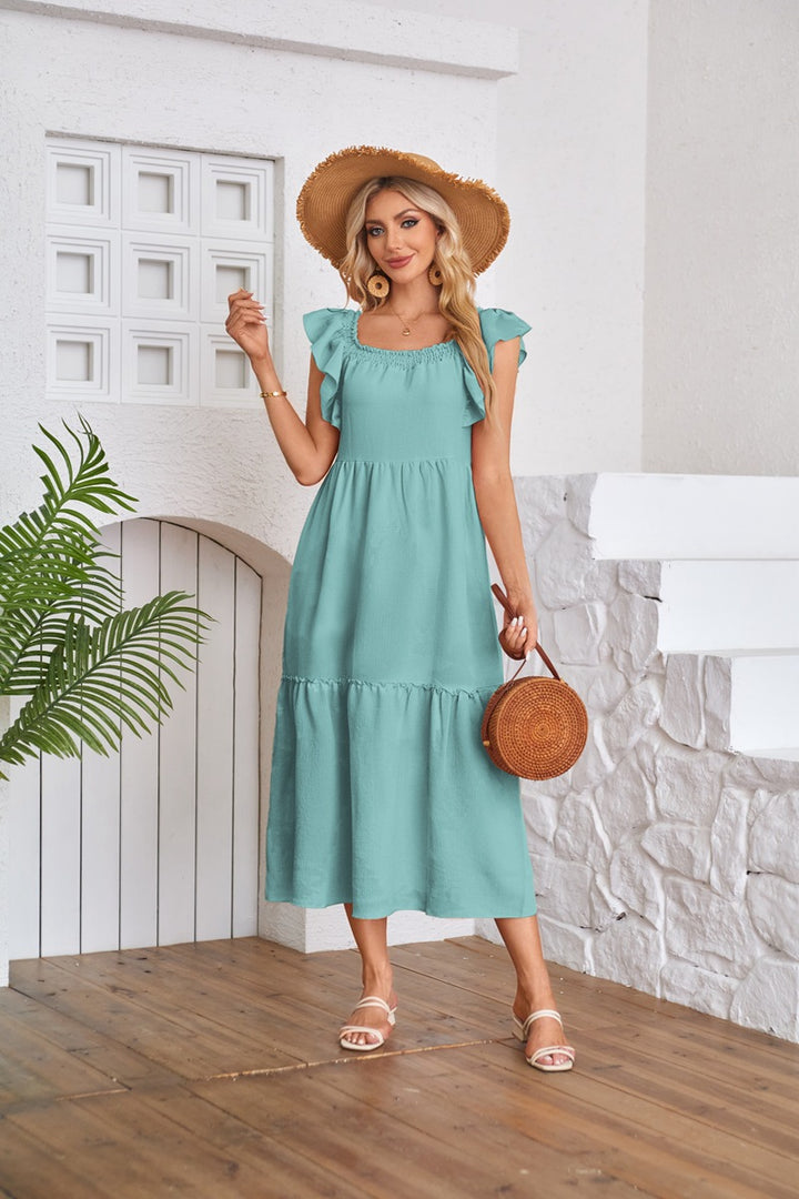 Aqua Solid Flutter Sleeved Empire Waist Smocked Dress