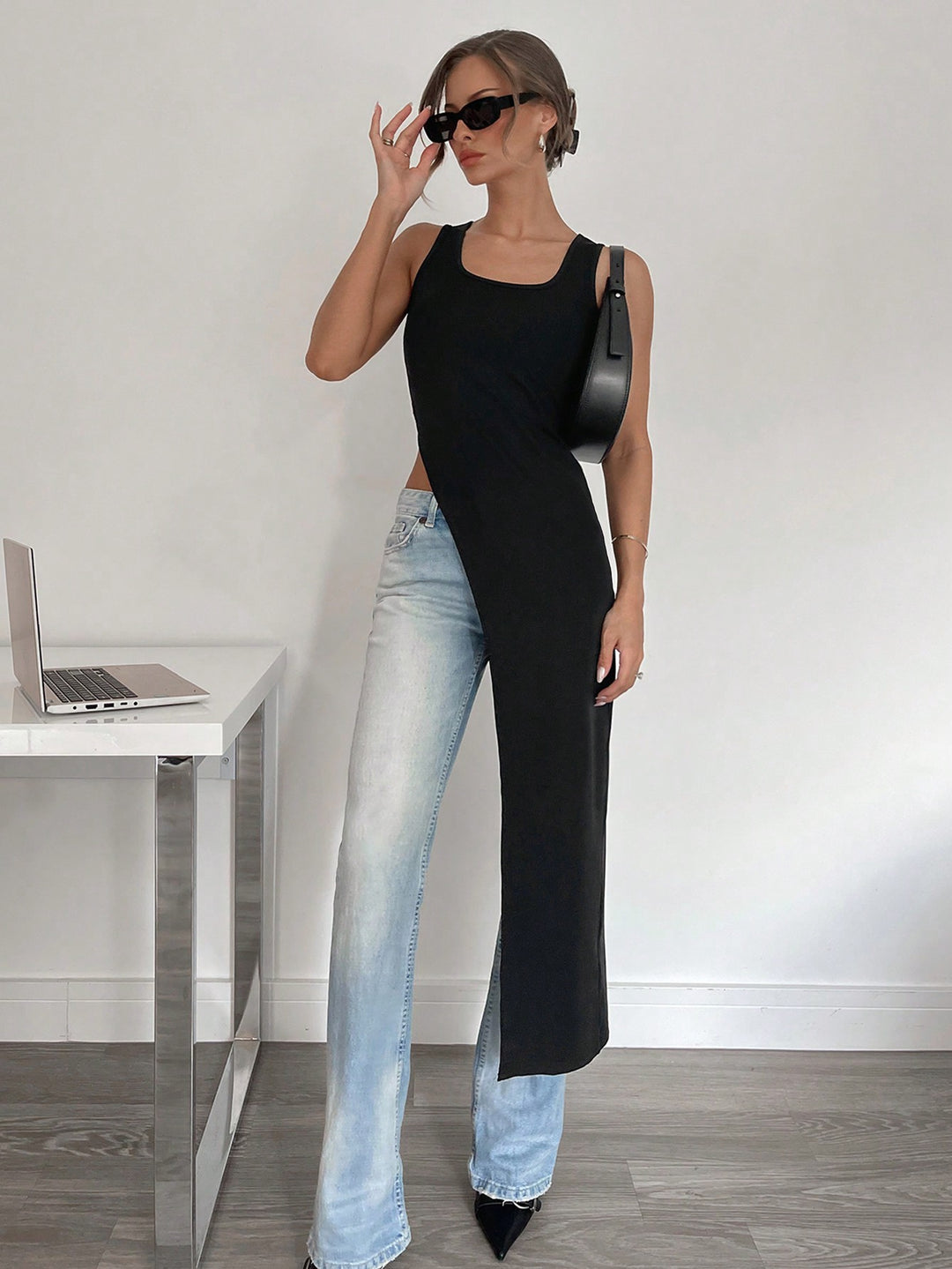 Black Sleeveless U- Neck Asymmetrical Top