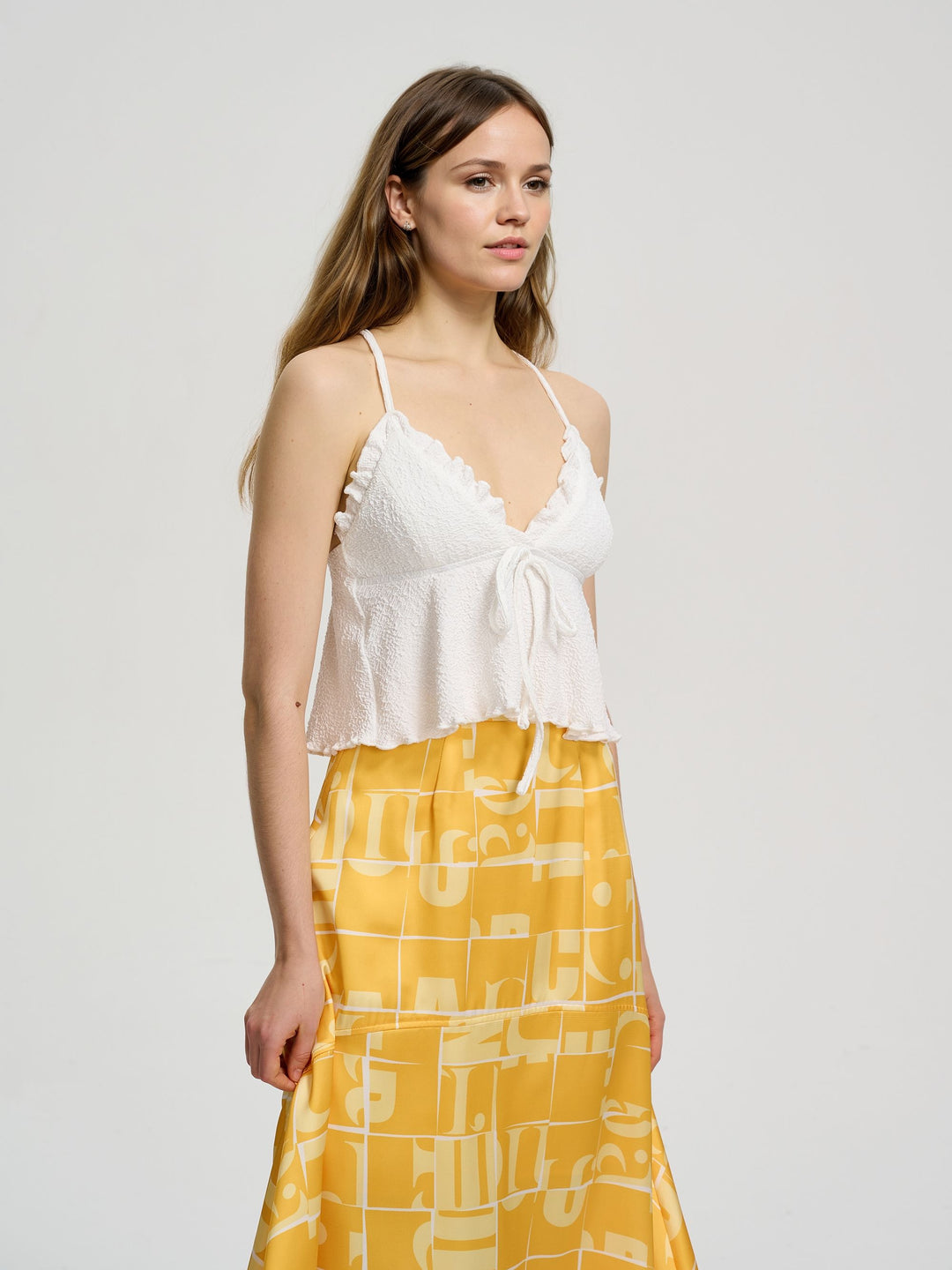 White Strappy Top With Ruffle Detail