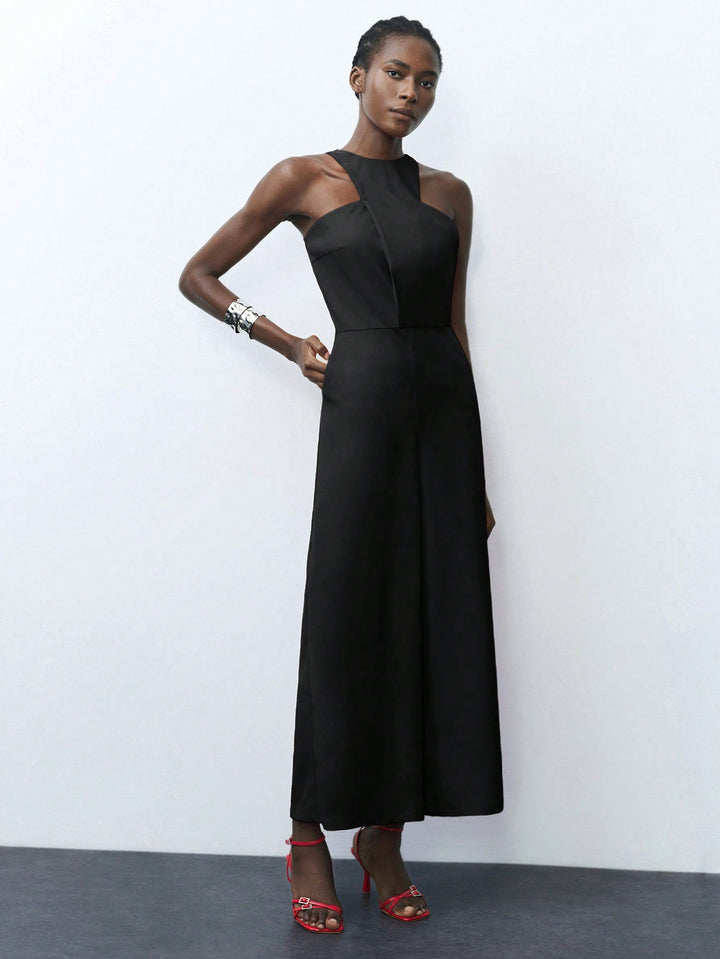 Black Cropped Jumpsuit With Square Cut Armhole Detail.