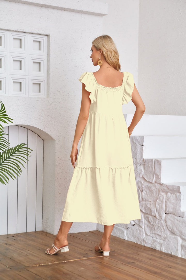Yellow Solid Flutter Sleeved Empire Waist Smocked Dress