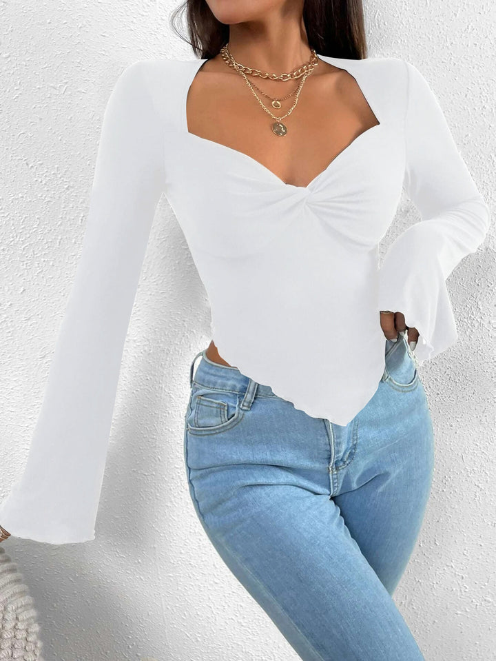 White Bell Sleeve Asymmetrical Hem Top