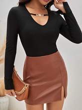 Black Plunge Neck With Metal Trim Strap Top