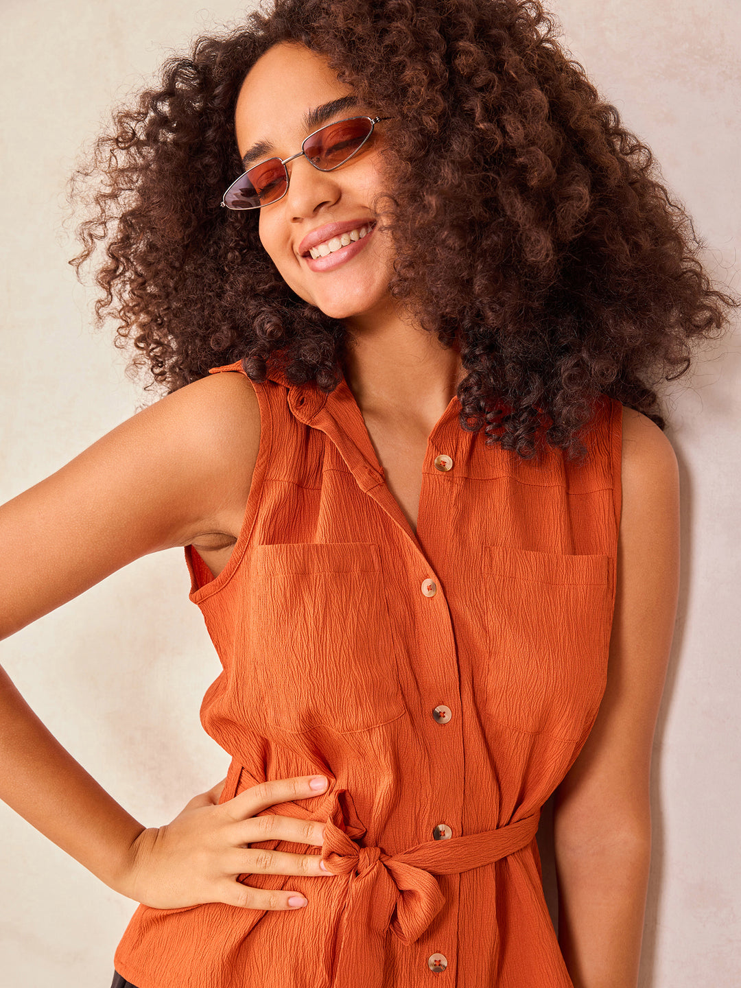 Rust Sleeveless Shirt With Pocket And Tie Up Detail