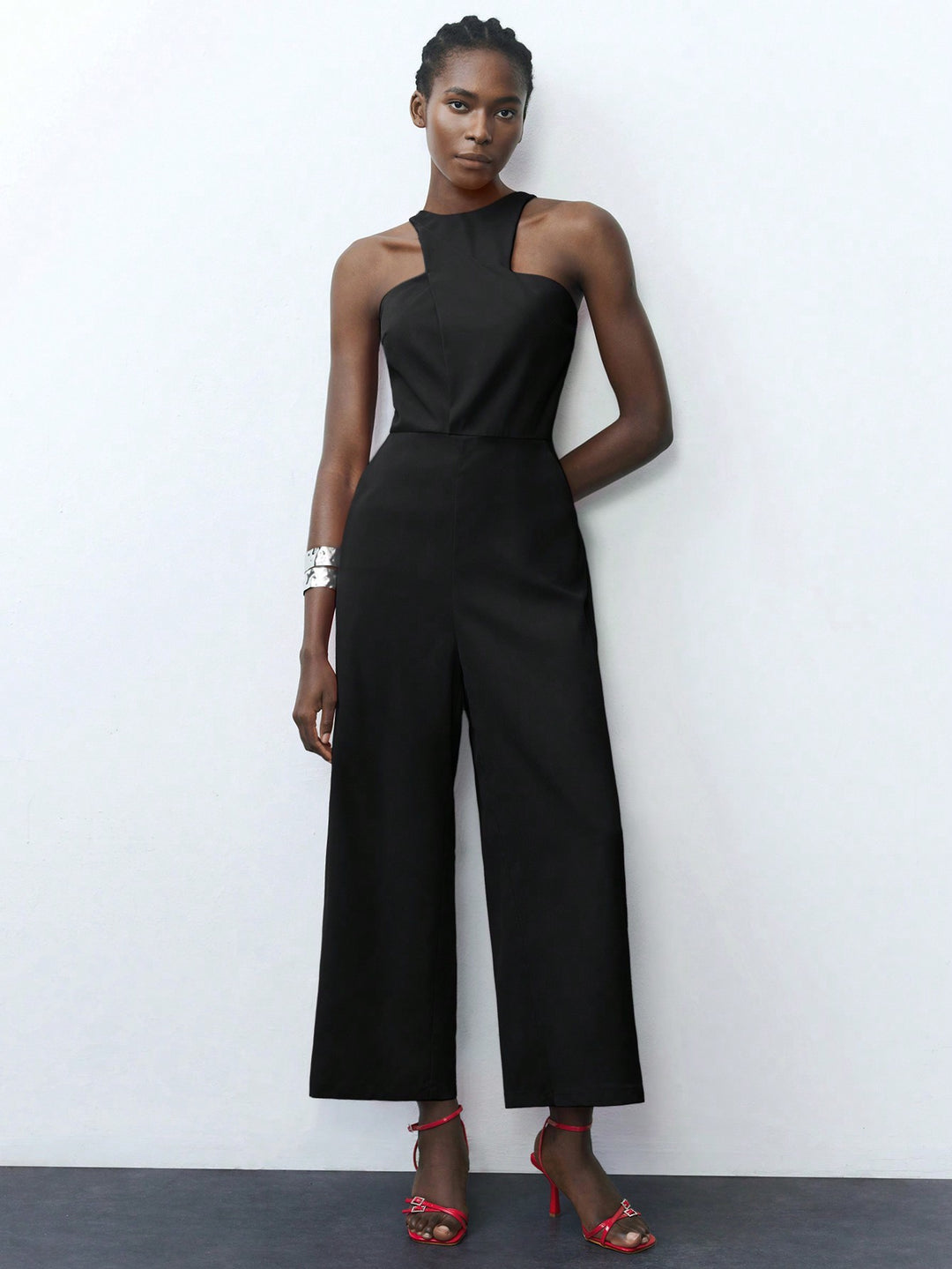 Black Cropped Jumpsuit With Square Cut Armhole Detail.