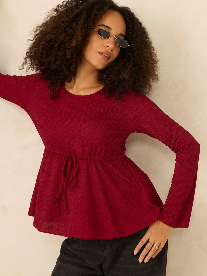 Maroon Round Neck Peplum Top With Full Sleeves