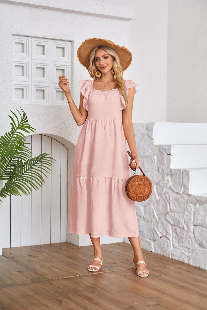 Pink Solid Flutter Sleeved Empire Waist Smocked Dress