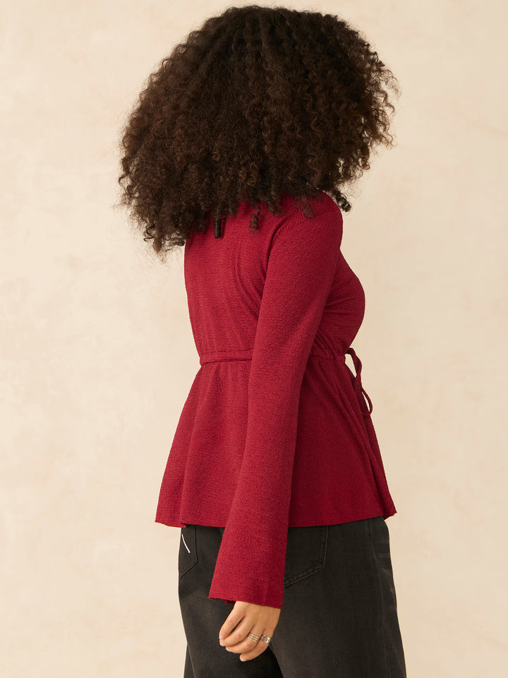 Maroon Round Neck Peplum Top With Full Sleeves