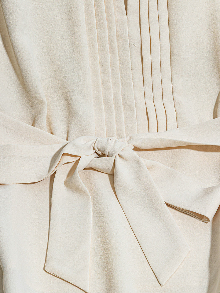 Off White Sleeveless Front Pleated Belted Top